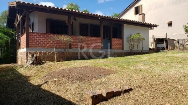 Casa em Porto Alegre, no bairro Hípica, com 2 dormitório(s), e 2 banheiros, à venda. — foto 2