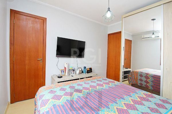 Casa em Porto Alegre, no bairro Hípica, com 3 dormitório(s), e 3 banheiros, à venda. — foto 34