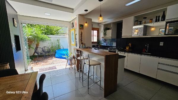 Casa em Porto Alegre, no bairro Hípica, com 3 dormitório(s), e 3 banheiros, à venda. — foto 10