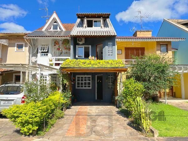 Casa Condominio em Porto Alegre, no bairro Cavalhada, com 3 dormitório(s), e 3 banheiros, à venda. — foto 1