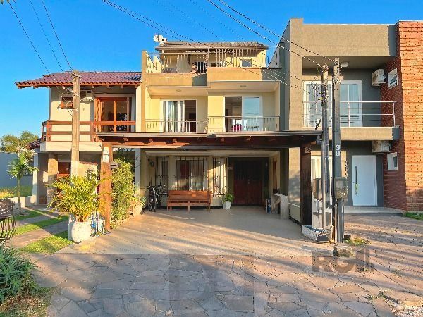 Casa em Porto Alegre, no bairro Hípica, com 3 dormitório(s), e 3 banheiros, à venda. — foto 2