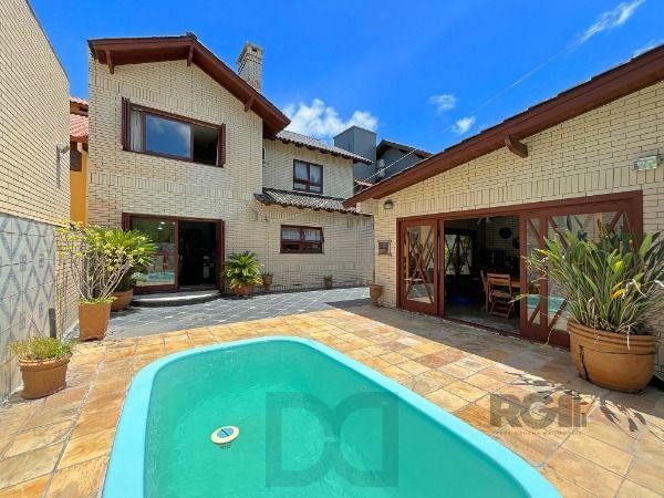 Casa em Porto Alegre, no bairro Ipanema, com 3 dormitório(s), e 3 banheiros, à venda. — foto 35