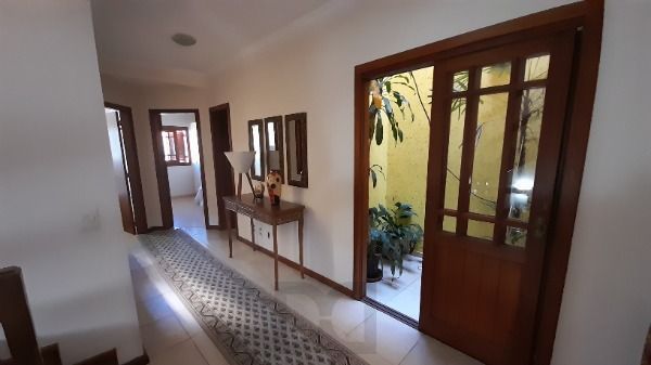 Casa em Porto Alegre, no bairro Espírito Santo, com 3 dormitório(s), e 3 banheiros, à venda. — foto 9