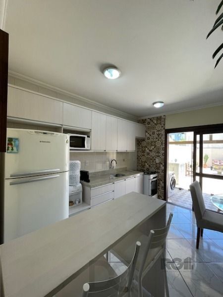 Casa em Porto Alegre, no bairro Hípica, com 3 dormitório(s), e 3 banheiros, à venda. — foto 6