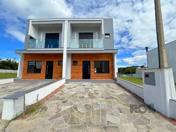 Casa Condominio em Porto Alegre, no bairro Campo Novo, com 3 dormitório(s), e 3 banheiros, à venda. — foto 1