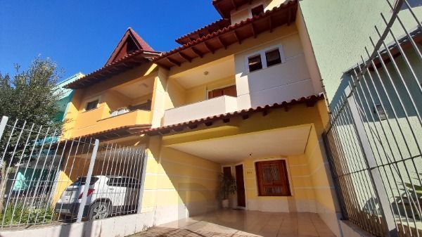 Casa em Porto Alegre, no bairro Espírito Santo, com 3 dormitório(s), e 3 banheiros, à venda. — foto 2