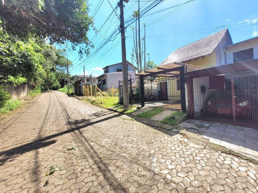 Sobrado com 4 Dormitórios em Rua Tranquila — foto 3