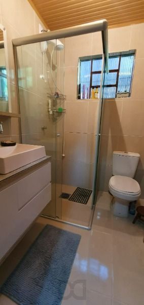 Casa em Porto Alegre, no bairro Ponta Grossa, com 3 dormitório(s), e 3 banheiros, à venda. — foto 5