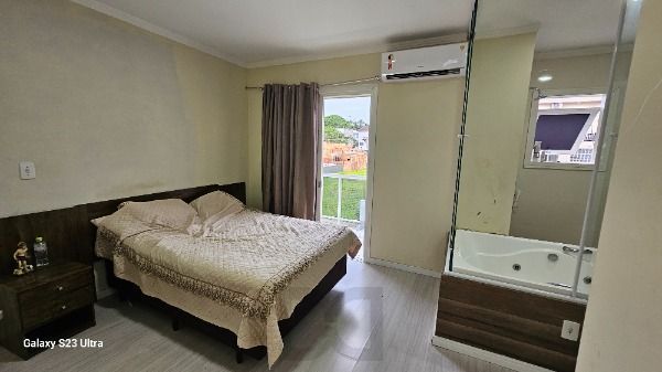 Casa em Porto Alegre, no bairro Hípica, com 3 dormitório(s), e 3 banheiros, à venda. — foto 42