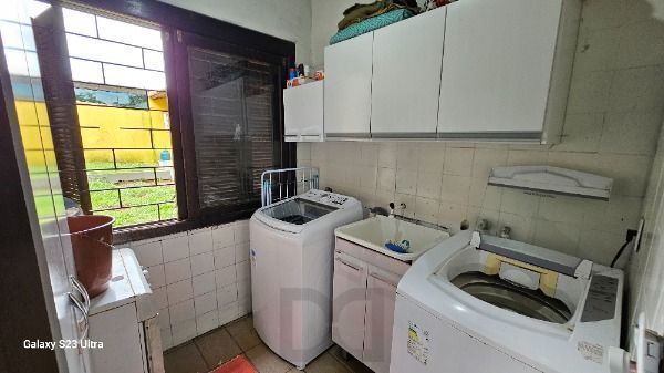 Casa em Porto Alegre, no bairro Belém Novo, com 3 dormitório(s), e 3 banheiros, à venda. — foto 9