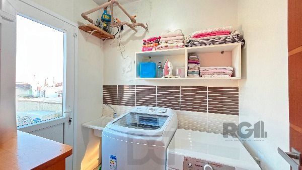 Casa em Porto Alegre, no bairro Hípica, com 3 dormitório(s), e 3 banheiros, à venda. — foto 47