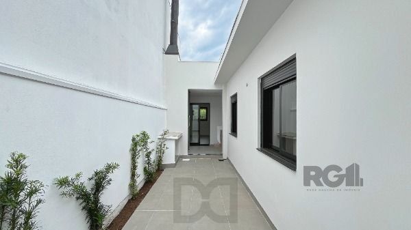 Casa em Porto Alegre, no bairro Hípica, com 3 dormitório(s), e 3 banheiros, à venda. — foto 25