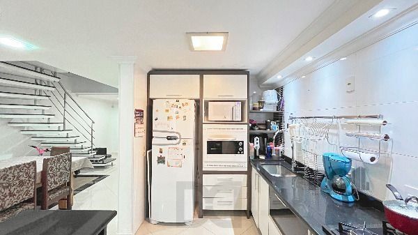 Casa em Porto Alegre, no bairro Hípica, com 3 dormitório(s), e 3 banheiros, à venda. — foto 19