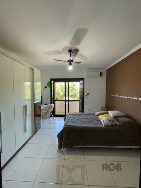 Casa em Porto Alegre, no bairro Hípica, com 3 dormitório(s), e 3 banheiros, à venda. — foto 9
