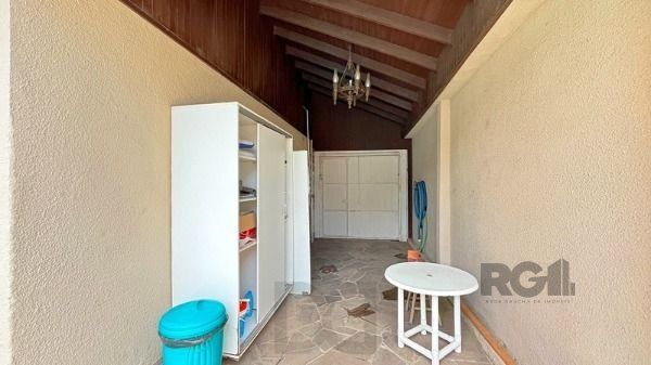 Casa em Porto Alegre, no bairro Guarujá, com 5 dormitório(s), e 5 banheiros, à venda. — foto 27