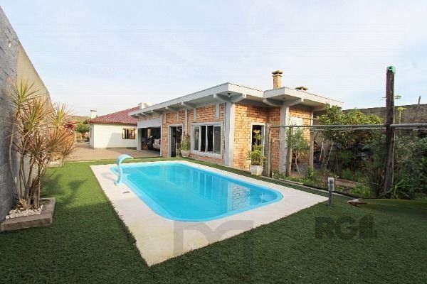 Casa em Porto Alegre, no bairro Belém Novo, com 3 dormitório(s), e 3 banheiros, à venda. — foto 35