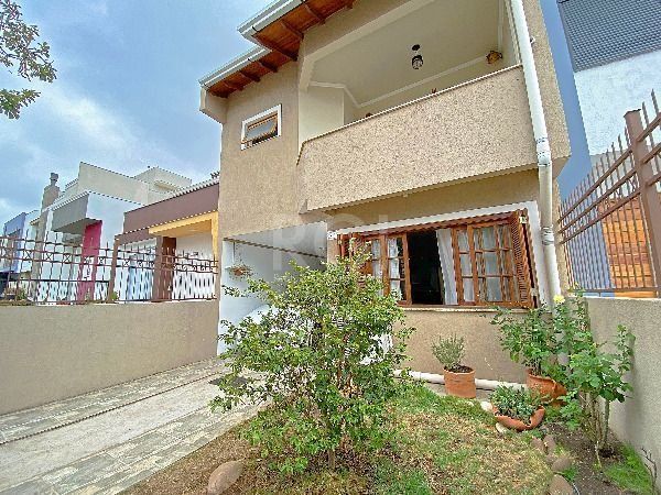 Casa em Porto Alegre, no bairro Hípica, com 3 dormitório(s), e 3 banheiros, à venda. — foto 4