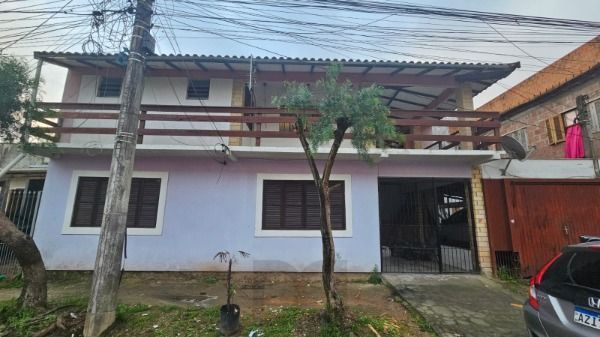 Casa em Porto Alegre, no bairro Hípica, à venda. — foto 2