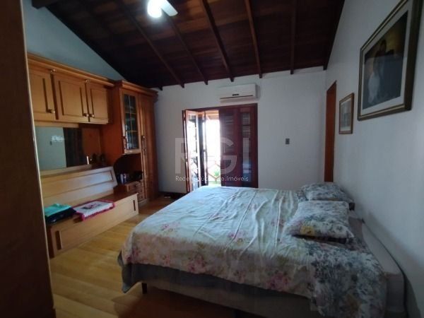 Casa em Porto Alegre, no bairro Hípica, com 3 dormitório(s), e 3 banheiros, à venda. — foto 22