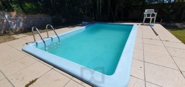 Casa em Porto Alegre, no bairro Ponta Grossa, com 3 dormitório(s), e 3 banheiros, à venda. — foto 21