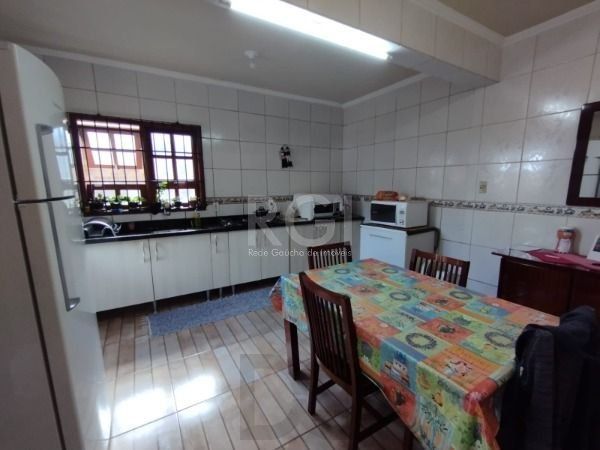 Casa em Porto Alegre, no bairro Hípica, com 3 dormitório(s), e 3 banheiros, à venda. — foto 9