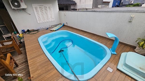 Casa em Porto Alegre, no bairro Hípica, com 3 dormitório(s), e 3 banheiros, à venda. — foto 50