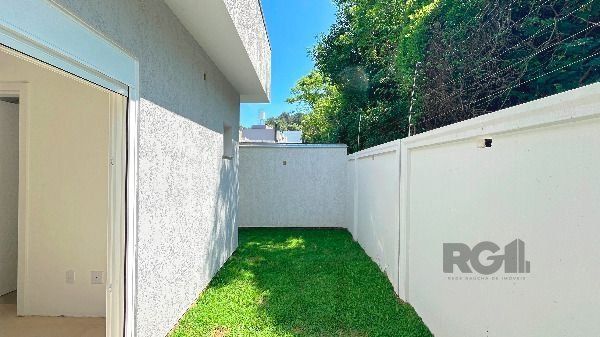 Casa Condominio em Porto Alegre, no bairro Hípica, com 3 dormitório(s), e 3 banheiros, à venda. — foto 30