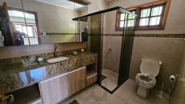 Casa térrea 3 dormitórios + escritório espaço gourmet e piscina terreno 11,00 x 40,00 bairro Camaquã ! — foto 18