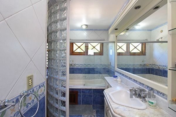 Casa em Porto Alegre, no bairro Ipanema, com 3 dormitório(s), e 3 banheiros, à venda. — foto 42