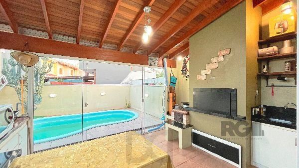 Casa em Porto Alegre, no bairro Hípica, com 3 dormitório(s), e 3 banheiros, à venda. — foto 22