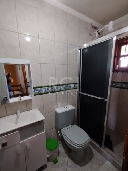 Casa em Porto Alegre, no bairro Hípica, com 3 dormitório(s), e 3 banheiros, à venda. — foto 15
