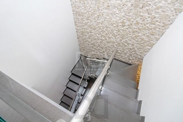 Casa em Porto Alegre, no bairro Hípica, com 3 dormitório(s), e 3 banheiros, à venda. — foto 23