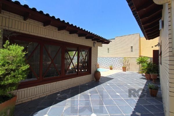 Casa em Porto Alegre, no bairro Ipanema, com 3 dormitório(s), e 3 banheiros, à venda. — foto 32