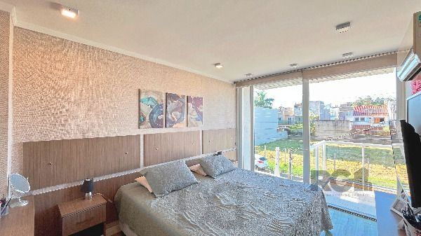 Casa em Porto Alegre, no bairro Hípica, com 3 dormitório(s), e 3 banheiros, à venda. — foto 37