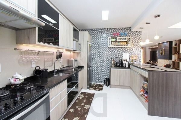 Casa em Porto Alegre, no bairro Hípica, com 3 dormitório(s), e 3 banheiros, à venda. — foto 13