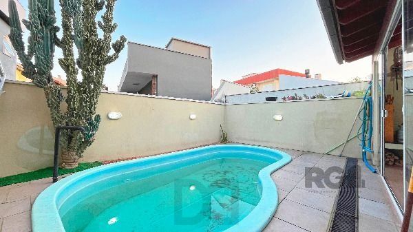 Casa em Porto Alegre, no bairro Hípica, com 3 dormitório(s), e 3 banheiros, à venda. — foto 26