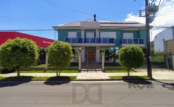 Casa em Porto Alegre, no bairro Hípica, com 3 dormitório(s), e 3 banheiros, à venda. — foto 2