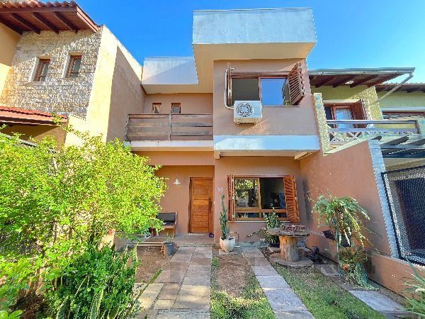 Casa em Porto Alegre, no bairro Hípica, com 3 dormitório(s), e 3 banheiros, à venda. — foto 1