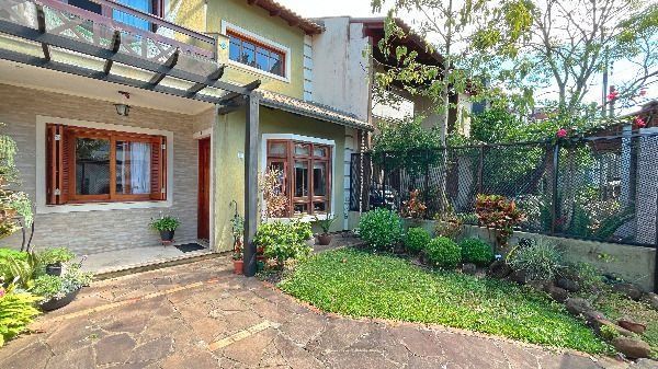 Casa em Porto Alegre, no bairro Hípica, com 3 dormitório(s), e 2 banheiros, à venda. — foto 3