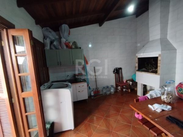 Casa em Porto Alegre, no bairro Hípica, com 3 dormitório(s), e 3 banheiros, à venda. — foto 30