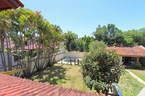 Casa em Porto Alegre, no bairro Ipanema, com 3 dormitório(s), e 3 banheiros, à venda. — foto 23