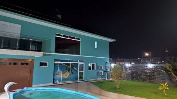 Casa em Porto Alegre, no bairro Hípica, com 3 dormitório(s), e 3 banheiros, à venda. — foto 25