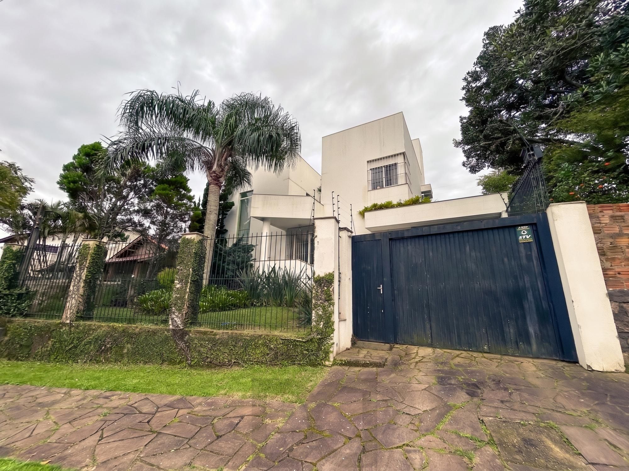 Casa em Porto Alegre, no bairro Espírito Santo, com 3 dormitório(s), e 3 banheiros, à venda. — foto 2