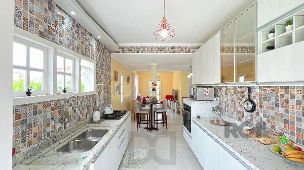 Casa em Porto Alegre, no bairro Hípica, com 2 dormitório(s), e 2 banheiros, à venda. — foto 16