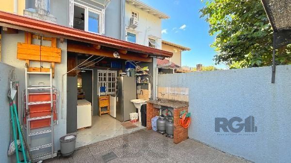 Casa Condominio em Porto Alegre, no bairro Cavalhada, com 3 dormitório(s), e 3 banheiros, à venda. — foto 24