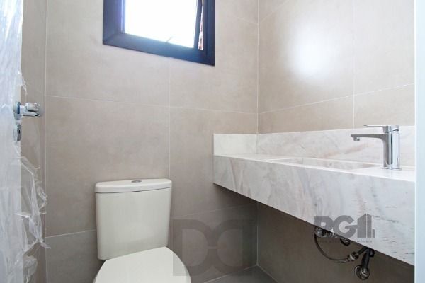 Casa Condominio em Porto Alegre, no bairro Campo Novo, com 3 dormitório(s), e 3 banheiros, à venda. — foto 9