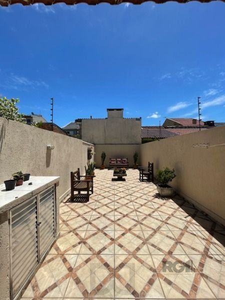 Casa em Porto Alegre, no bairro Hípica, com 3 dormitório(s), e 3 banheiros, à venda. — foto 21