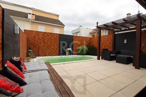 Casa em Porto Alegre, no bairro Hípica, com 3 dormitório(s), e 3 banheiros, à venda. — foto 22