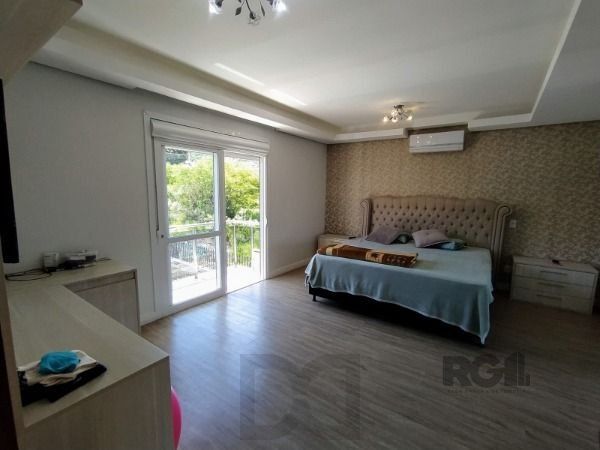 Casa em Porto Alegre, no bairro Hípica, com 3 dormitório(s), e 3 banheiros, à venda. — foto 9