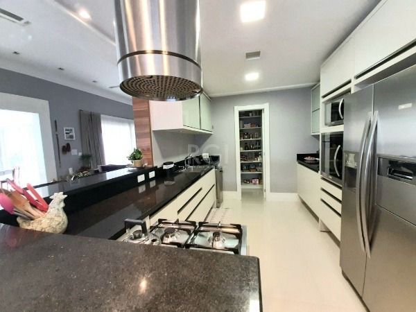 Casa Condominio em Porto Alegre, no bairro Belém Novo, com 3 dormitório(s), e 3 banheiros, à venda. — foto 10